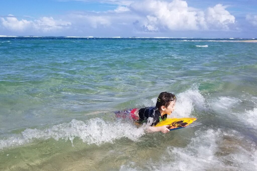 Boogie boarding at Tunnels Beach in Kauai